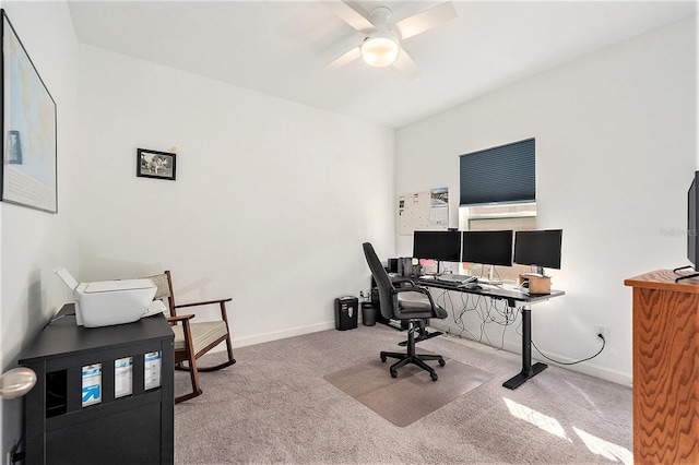 office area with light carpet and ceiling fan