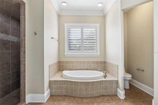 bathroom with tile patterned flooring, ornamental molding, shower with separate bathtub, and toilet