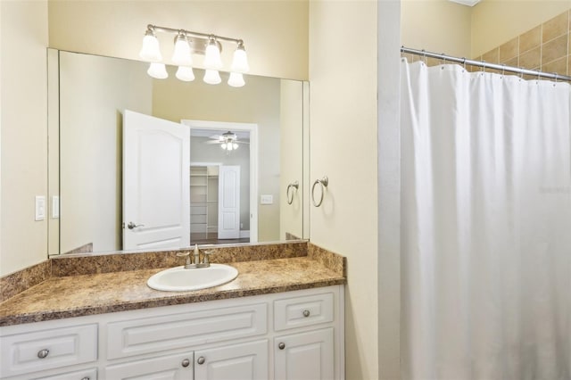 bathroom featuring vanity and ceiling fan