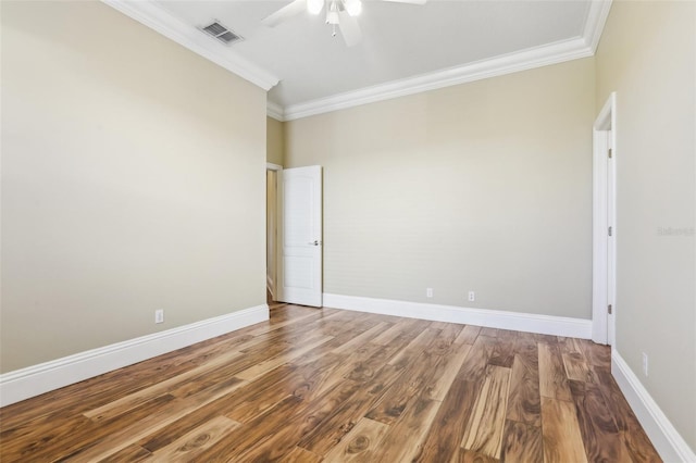 unfurnished room featuring ceiling fan, ornamental molding, and hardwood / wood-style floors