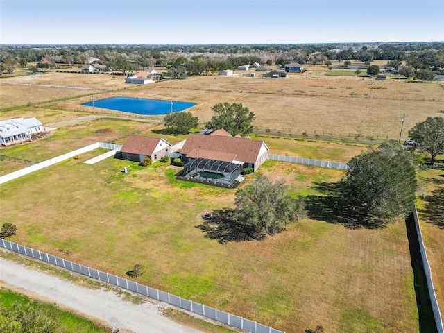 birds eye view of property with a rural view