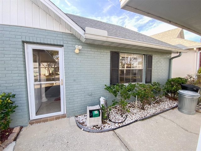 entrance to property featuring a patio area