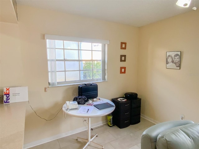 office area featuring light tile patterned flooring