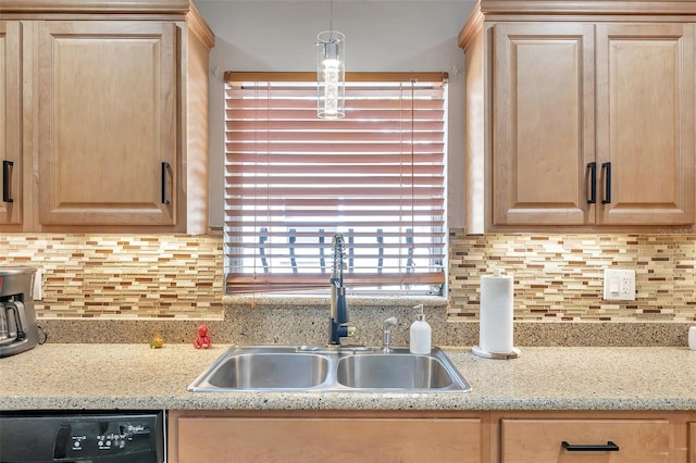 kitchen featuring sink, dishwasher, light brown cabinetry, and backsplash