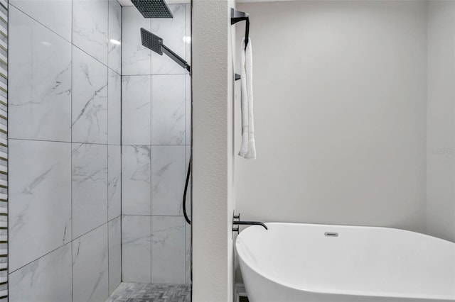 bathroom with shower with separate bathtub