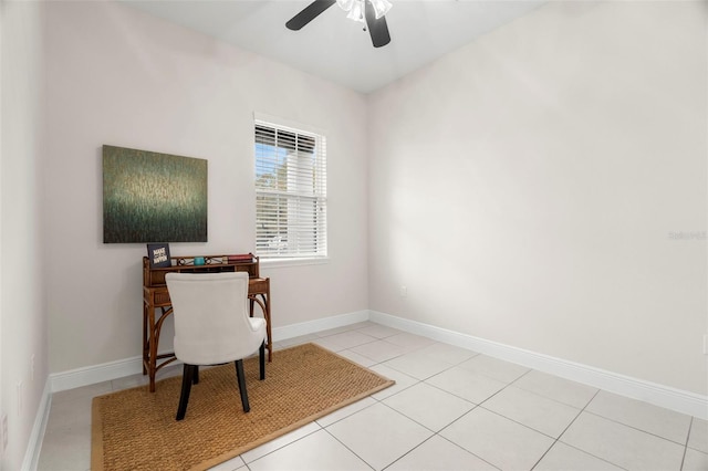 office space with light tile patterned floors and ceiling fan