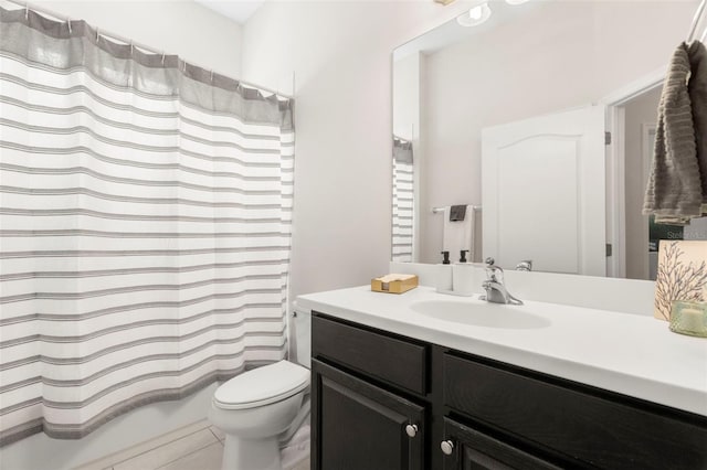 full bathroom with vanity, toilet, and shower / tub combo