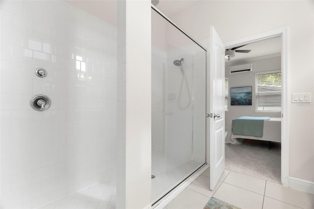 bathroom with a tile shower, tile patterned floors, and an AC wall unit