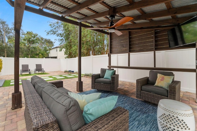 view of patio with ceiling fan and outdoor lounge area