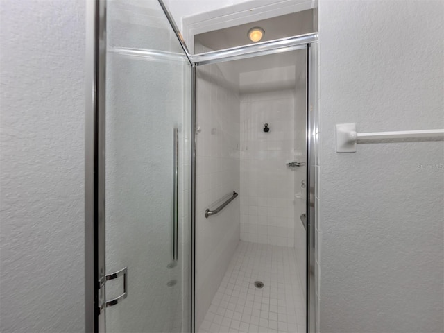 bathroom featuring walk in shower