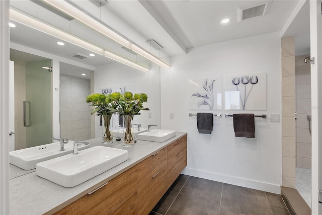 bathroom featuring vanity and a shower