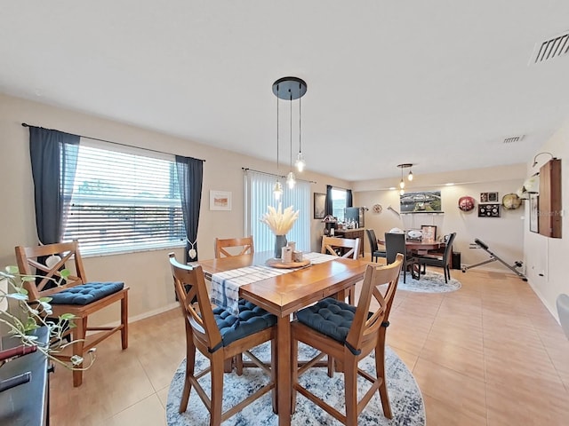 dining room with light tile patterned floors