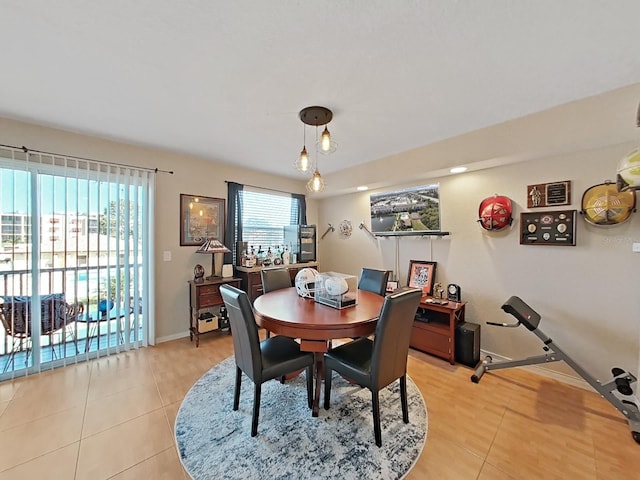 dining room featuring light tile patterned floors