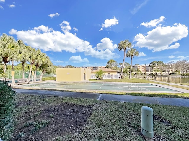 view of home's community with a water view