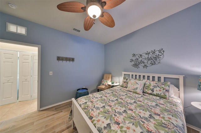 bedroom with vaulted ceiling and ceiling fan