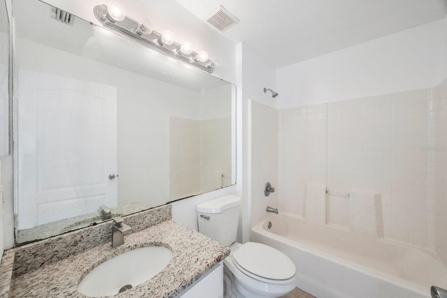 full bathroom with shower / tub combination, vanity, and toilet