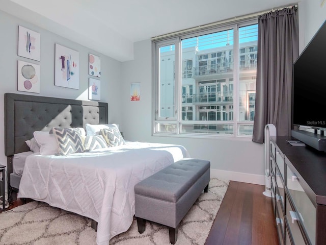 bedroom featuring hardwood / wood-style floors