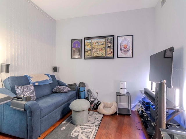 living room featuring dark hardwood / wood-style floors