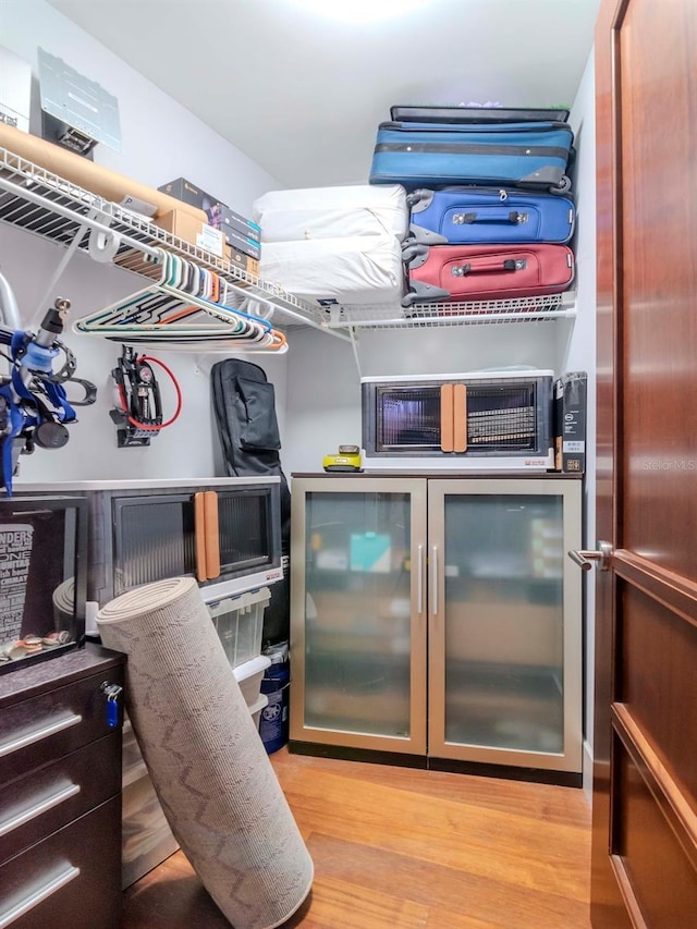 walk in closet featuring light wood-type flooring