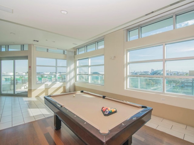 rec room featuring tile patterned flooring, a wealth of natural light, and billiards