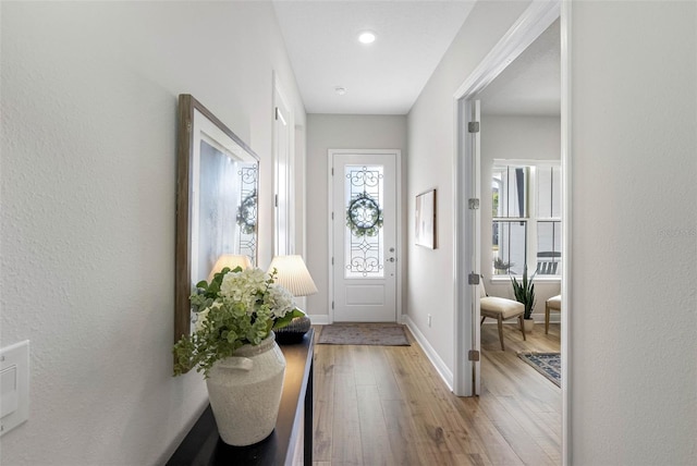 doorway featuring light hardwood / wood-style floors