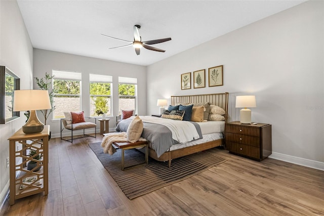 bedroom featuring ceiling fan and hardwood / wood-style floors