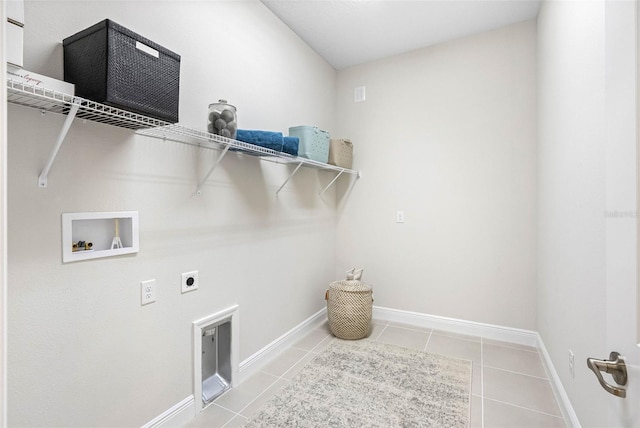 laundry area with tile patterned floors, washer hookup, and electric dryer hookup