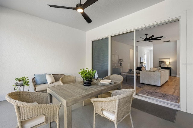 view of patio / terrace featuring ceiling fan