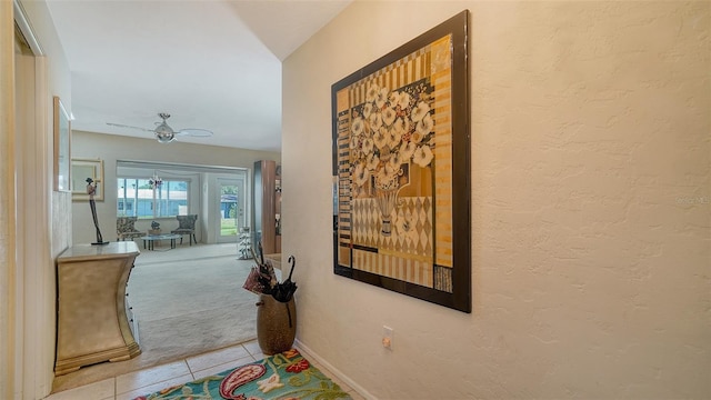 hall featuring tile patterned floors