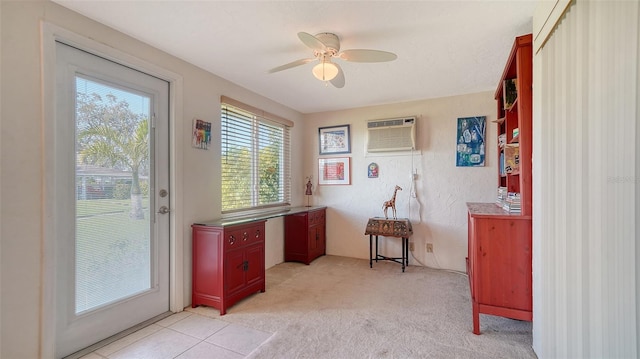 entryway featuring light carpet, a wall mounted air conditioner, and ceiling fan