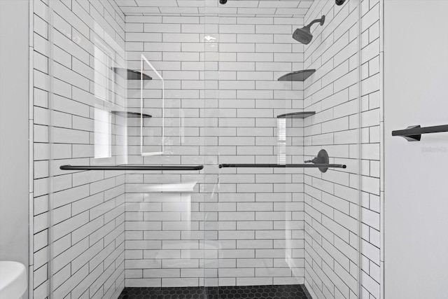 bathroom with walk in shower