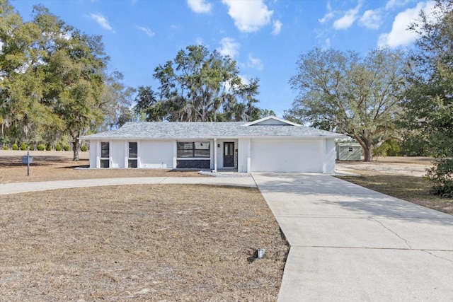 ranch-style house featuring a garage