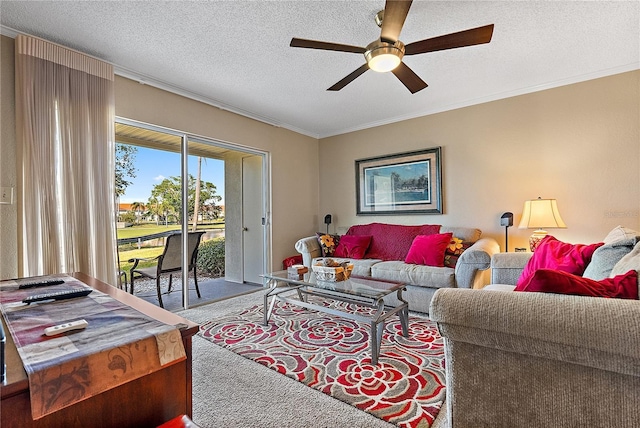 living room featuring crown molding, a textured ceiling, and carpet flooring