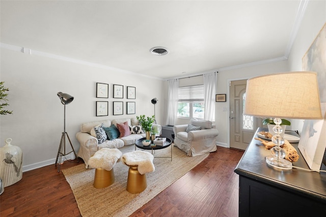 living room with ornamental molding and dark hardwood / wood-style flooring