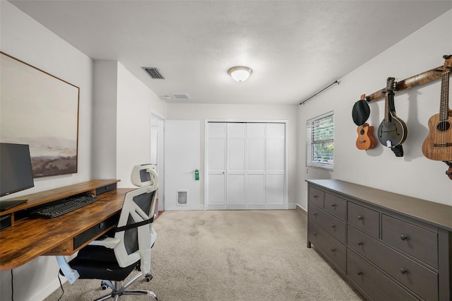 home office with light colored carpet