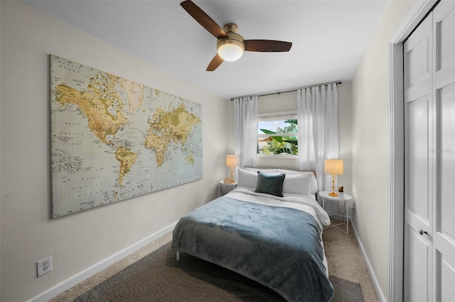 bedroom with ceiling fan and carpet