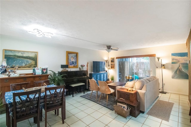 living room with light tile patterned floors and ceiling fan