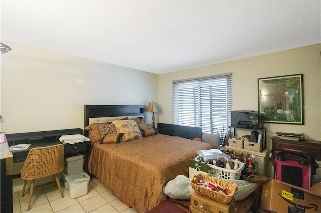 bedroom featuring light tile patterned flooring