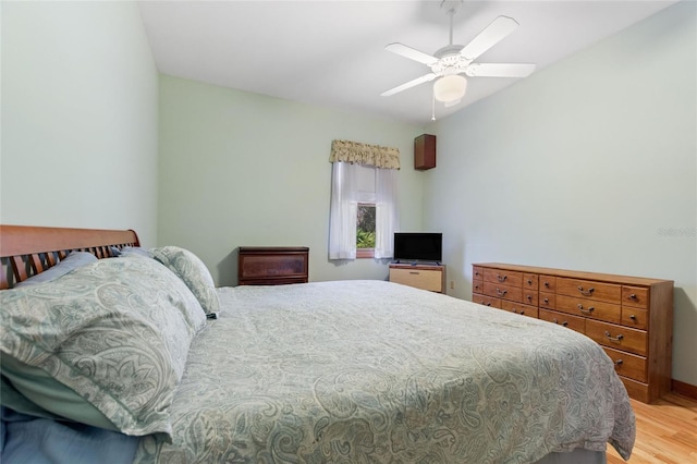 bedroom featuring ceiling fan and light hardwood / wood-style floors