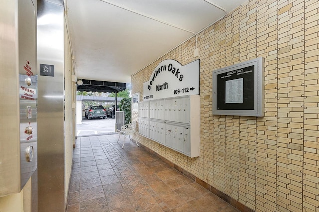 hallway with mail boxes