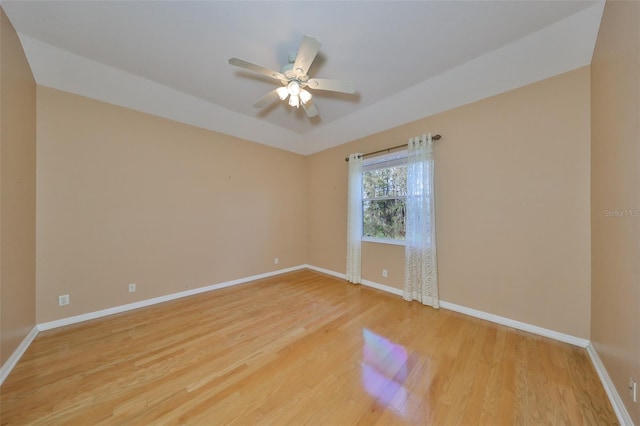 unfurnished room with ceiling fan and light hardwood / wood-style floors