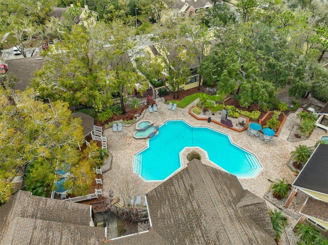 view of swimming pool with a pool with connected hot tub and a patio