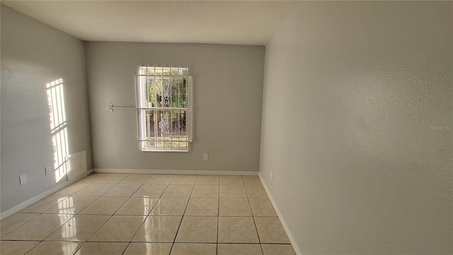 view of tiled spare room