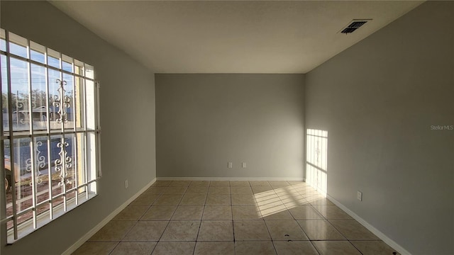 empty room featuring tile patterned flooring