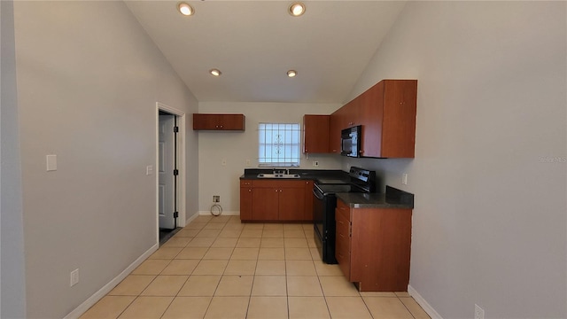 kitchen featuring light tile patterned floors, high vaulted ceiling, sink, and black appliances