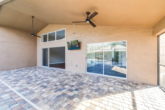 view of patio / terrace featuring ceiling fan