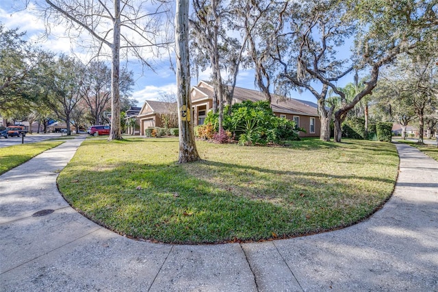 exterior space featuring a front yard