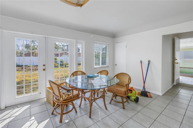 tiled dining room with french doors