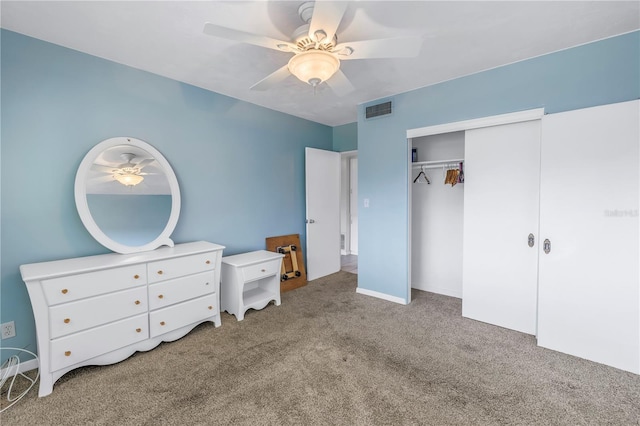 unfurnished bedroom featuring light carpet, a closet, and ceiling fan