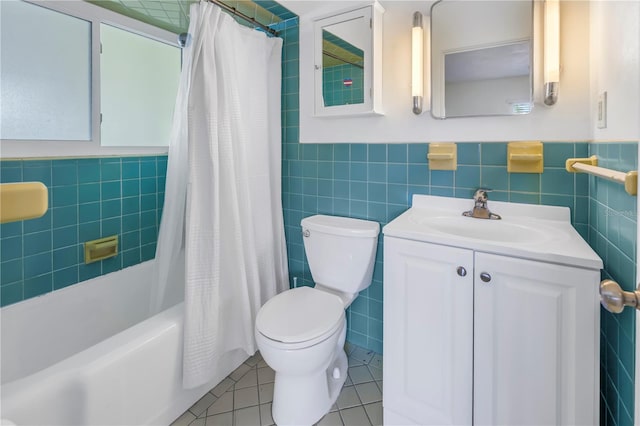 full bathroom featuring tile walls, tile patterned flooring, vanity, toilet, and shower / bath combo with shower curtain